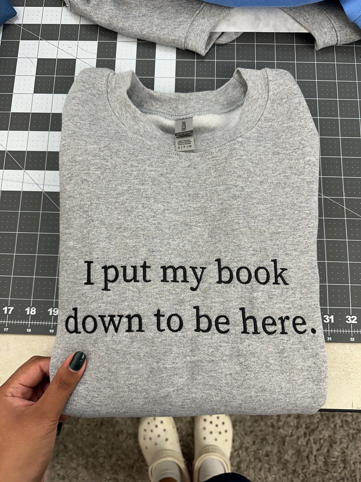 Oopsie Embroidered I Put My Book Down To Be Here Sweatshirt (Small)