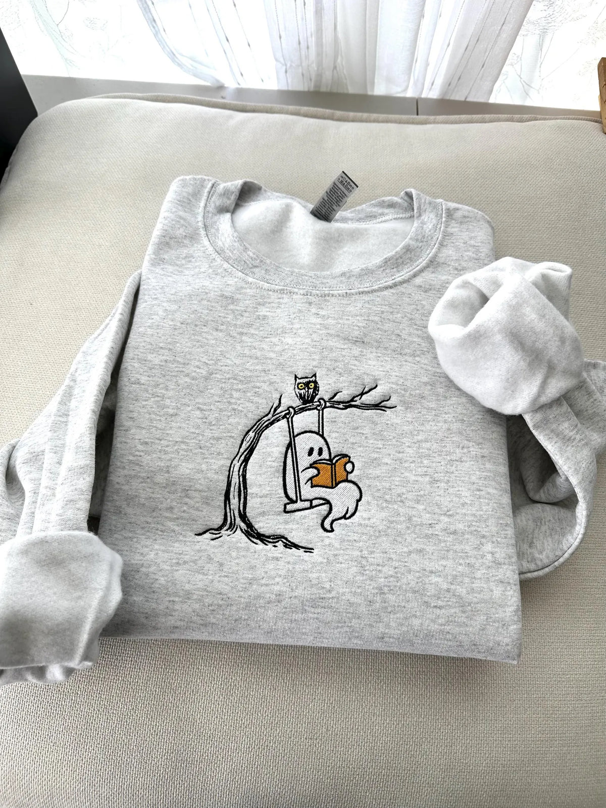Embroidered Ghost Reading Sweatshirt